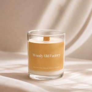 Studio Kinza Woody Old Factory leather and sandalwood soy candle in glass jar