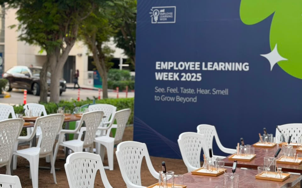 Creative workplace learning session using candle-making activities to strengthen communication, teamwork and employee engagement.