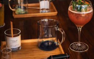 Luxury hen party celebration in Dubai featuring a candle-making workshop and afternoon tea