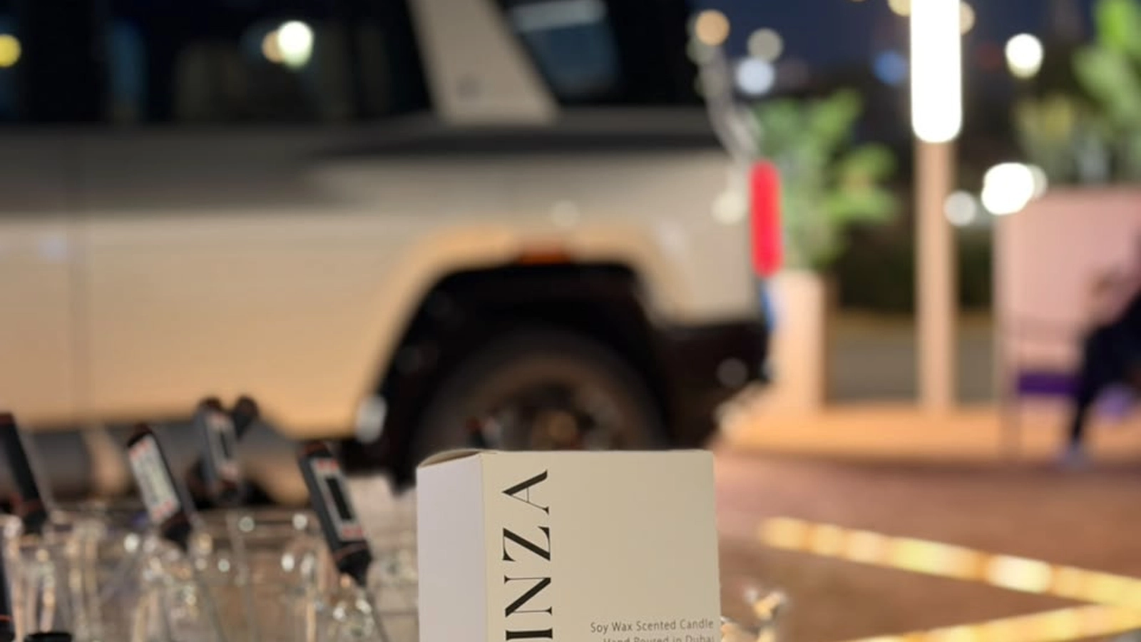 Ambient wedding reception venue featuring a curated live candle bar and personalized wedding favours in Dubai