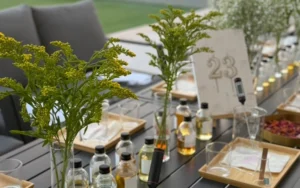 Handcrafted soy candle gift set arranged on a wooden tray for a new home housewarming gift in Dubai