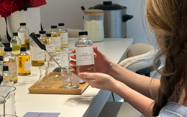 Fragrance for Candle Making: What Is Fragrance Load? A Simple Guide 48 Measuring concentrated fragrance oils on a digital scale for natural soy candle making