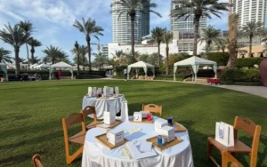 Group of teenagers participating in a creative soy candle making activity for a birthday in Dubai