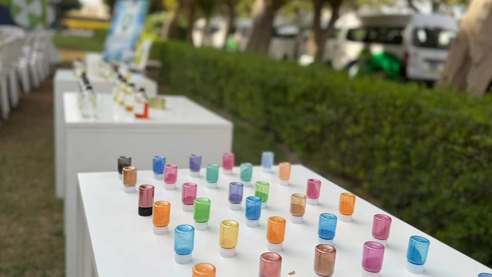 Organized workshop table layout and supplies prepared for a teen candle making birthday party in Dubai