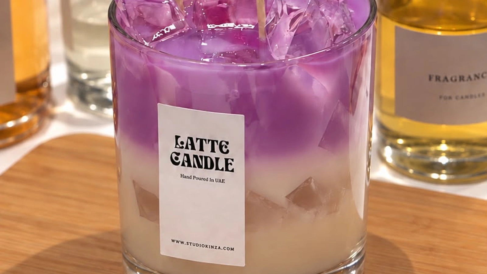 Friends blending scents and making candles at an alternative birthday party in Dubai